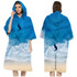 A hooded change towel in blue featuring a beach and wave design, with a logo on the front.