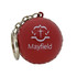 A red cricket ball stress reliever attached to a keyring, featuring a logo.