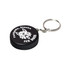 A black hockey puck stress reliever with a silver keyring and a logo featuring a wolf design.