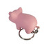 A pink mini pig stress item attached to a metal keyring, featuring a smooth texture and rounded shape.
