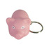 A pink mini pig stress item attached to a keyring, featuring a simple facial design and silver keyring.
