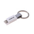 A grey and white magnetic charging cable with a keyring attachment and branding.