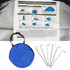 A blue pop-up beach tent with a carrying bag and six metal stakes for securing the tent.
