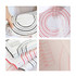 A silicone pastry mat with red and black measurement markings, featuring a grid pattern and a textured surface.