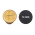 A wooden Bluetooth speaker with a wireless charger on one side, and a black charging pad on the other. Both have branding.