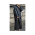A black, reusable PEVA raincoat with a hood and a logo, featuring a long, straight design.