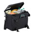 A black cooler bag with a zippered top, filled with bottles, fruit, and containers, featuring an exterior pocket.