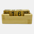 A bamboo perpetual calendar with wooden blocks displaying the date and month, housed in a rectangular base.