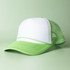 A green and white Trucker Roadhouse Cap featuring a mesh back and a curved brim.