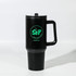 A drink bottle in black with a sturdy handle and a lid, featuring a logo in green.