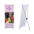 A small X-frame banner displaying fruit images, with a purple background and a logo at the top. It has a sturdy tripod base.