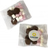 A clear packet containing brown chocolate pieces and pink and white marshmallows, with a logo on the package.