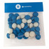 A clear bag filled with blue and white choc beans, featuring a branding logo at the top.