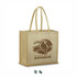 A tan juco tote bag with two sturdy handles and a logo featuring a parrot and tropical elements.