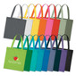 A collection of cotton tote bags in various colours, featuring a logo on some bags.