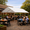 18' x 30' Traditional Canopy Tent covering guests at a restaurant