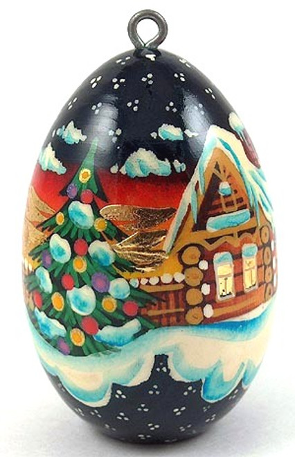 Hand painted on wood, this  ornament has accents of 24 kt gold leaf which shine and sparkle on the depicted Winter Village Scene. This is a beautiful, and sturdy addition to your Christmas tree! Approx 2.2" tall, sizes vary as they are each hand made