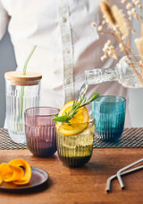 3 La Rochere Ouessant glass Tumblers in different colours on a table
