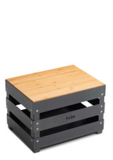 Höfats Crate Board – Bamboo Serving & Stool Lid on top of the fire crate