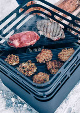 Cooking outdoors with two Höfats CUBE Plancha – Enameled Cast‑Iron Griddle Plate Cooking outdoors with two Höfats CUBE Plancha – Enameled Cast‑Iron Griddle Plate