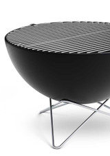 two Höfats BOWL 70 Grid – Stainless Steel Grill Halves on top of the bowl 70 fire pit
