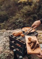 Cooking outdoors on the Höfats Crate Fire Basket Cooking outdoors on the Höfats Crate Fire Basket