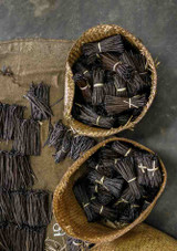 harvested vanilla pods in baskets
