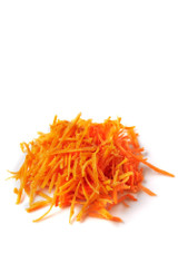 a pile of finely grated strips of carrot in Julienne style