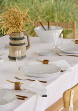 a number places set with the Costa Nova Dinner Plates from the Nova collection a number places set with the Costa Nova Dinner Plates from the Nova collection