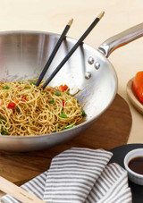 Noodles cooked and served in the De Buyer Alchimy Stainless Steel Wok - 32 cm