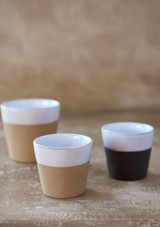 A selection of Grespresso nature lungo coffee cups on a table