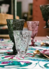 La Rochere Lyonnais Tumbler 200ml Set of 6 on a table accompanied by a pink and green version