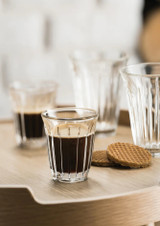 La Rochere Zinc Cup 100ml Set of 6 on a table with coffee