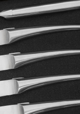 Close-up of the handles on the Laguiole en Aubrac logo on the Piece Steak Knife Set