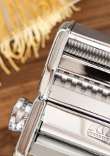 Close-up of the pasta rollers on the Marcato Atlasmotor Plus - Electric Pasta Machine