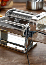 Marcato Atlasmotor Plus - Electric Pasta Machine on a table