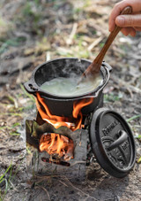 pot cooking on top of the Petromax BK1 Stainless Steel Hobo camping Stove outdoors