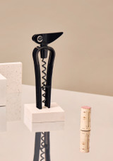 L’Atelier du Vin Corkscrew – Chic Monsieur Night on a table with a cork