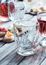 La Rochere Wine Glass Belle Ile 290ml - Set of 6 on a table beside a glass of wine