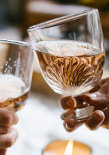 La Rochere Wine Glass Belle Ile 290ml - Set of 6 lifestyle shot of two people holding the glasses full of wine