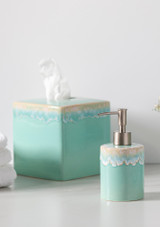 Costa Nova Soap & Lotion Pump Taormina Bath Aqua - Blue in a bathroom with matching tissue box and soap dish
