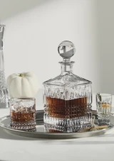 Waterford Lismore Diamond Square Decanter 700ml on a tray filled with whiskey  beside a glass