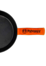 Petromax Aramid Handle Cover HANDLE300 – orange suede leather sleeve for cast-iron skillet handle, shown on a pans handle.