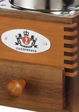 Zassenhaus Coffee Mill Montevideo – manual coffee grinder with walnut and pearwood body, shown close up.