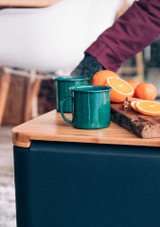 Drinks served on top of the Höfats CUBE Board side table top