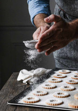 Cookies being baked on the De Buyer Perforated Baking Tray – 40 x 30 cm with Oblique Edges Cookies being baked on the De Buyer Perforated Baking Tray – 40 x 30 cm with Oblique Edges