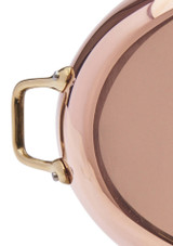 Close-up of the brass handle and base of the De Buyer Inocuivre Copper Oval Dish – 36 cm