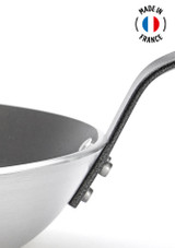 Close-up of the riveted handle on the De Buyer Choc Resto Induction Non-Stick Frying Pan – 32 cm, made in France