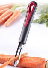 Westmark Gallant Peeler with Fixed Blade being used to peel a carrot