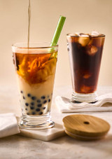 Bubble tea served in the La Rochere Bee Bubble Tea Glass with Bamboo Lid & Straw – 460ml